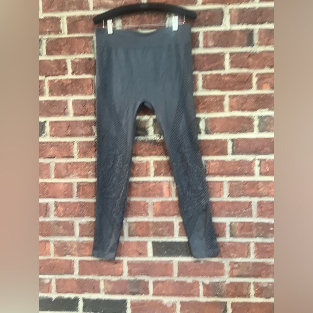 Dark grey maternity leggings with paisley print leg details